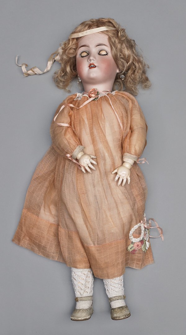 Heinrich Handwerck Simon and Halbig bisque head d: Heinrich Handwerck Simon and Halbig bisque head doll, inscribed 2 1/4, with sleep eyes, an open mouth, and a composition body, 20'' h.