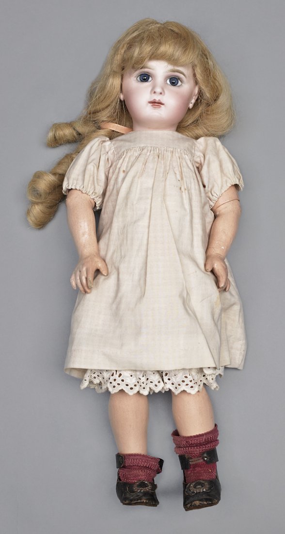 French Jumeau bisque head doll, 19th c., inscribe: French Jumeau bisque head doll, 19th c., inscribed Depose Jumeau 8, with fixed eyes, a closed mouth, and a jointed wood body, 18'' h.
