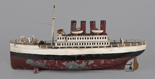 Painted tin clockwork boat, 22'' l.: Painted tin clockwork boat, 22'' l.