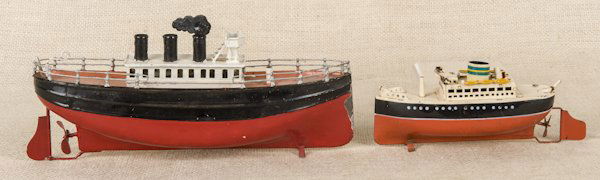 Arnold and Carette tin clockwork ocean liners, 7'': Arnold and Carette tin clockwork ocean liners, 7'' l. and 10 1/2'' l.