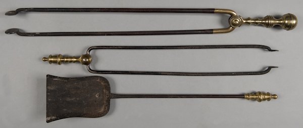 Two Federal brass and iron fire tongs, together w: Two Federal brass and iron fire tongs, together with a shovel.