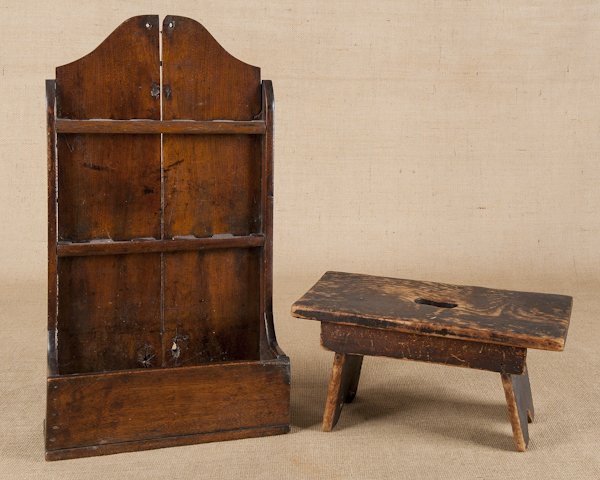 English mahogany spoon rack, 19th c., 23'' h., 12: English mahogany spoon rack, 19th c., 23'' h., 12 1/4'' w., together with a footstool.