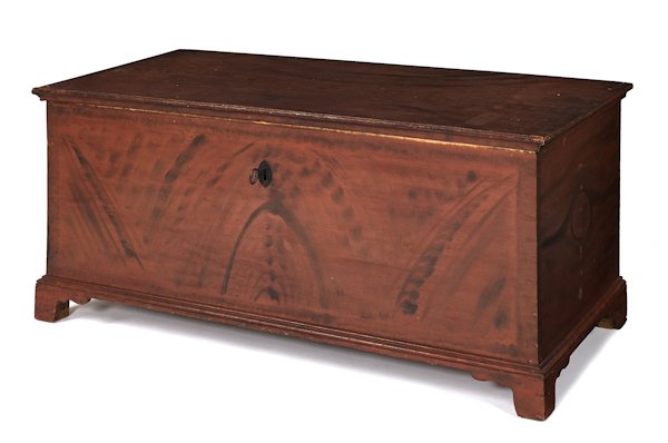 Pennsylvania painted pine blanket chest, early 19: Pennsylvania painted pine blanket chest, early 19th c., with a later red and black grained surface, 23 1/2'' h., 49'' w.