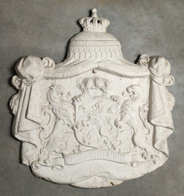 Cast iron architectural plaque of a crest, 19th c: Cast iron architectural plaque of a crest, 19th c., 33'' h., 31'' w.