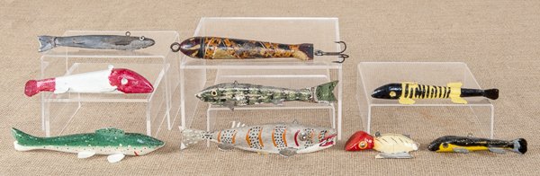 Eight carved and painted fish decoys, mid 20th c: Eight carved and painted fish decoys, mid 20th c., longest - 7 3/4'', together with a homemade fishing lure, 7'' l.