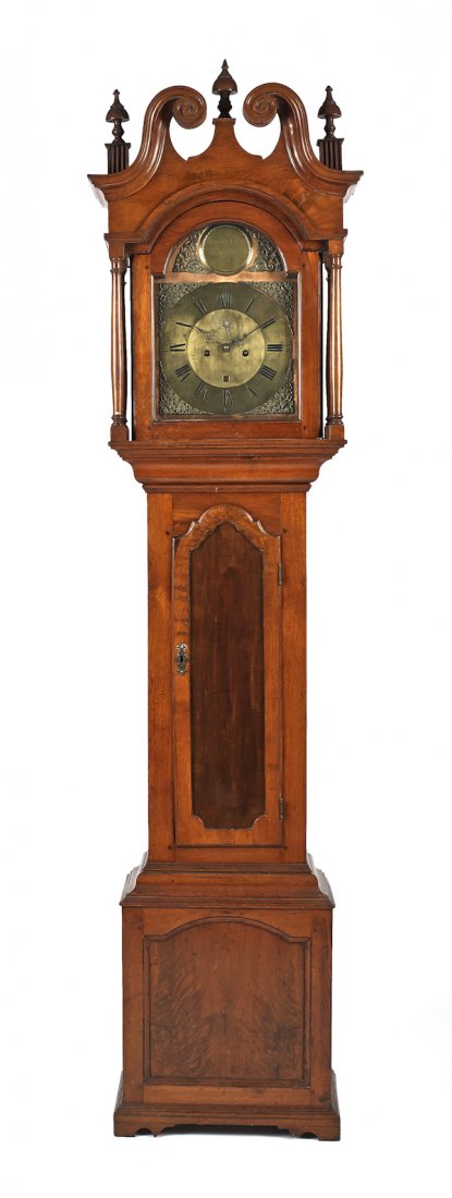 Delaware Chippendale walnut tall case clock, dat: Delaware Chippendale walnut tall case clock, dated 1778, the broken arch bonnet enclosing an eight-day works with a copper face and brass dial, the name boss inscribed Thomas Crow Wilmington 1778, abo