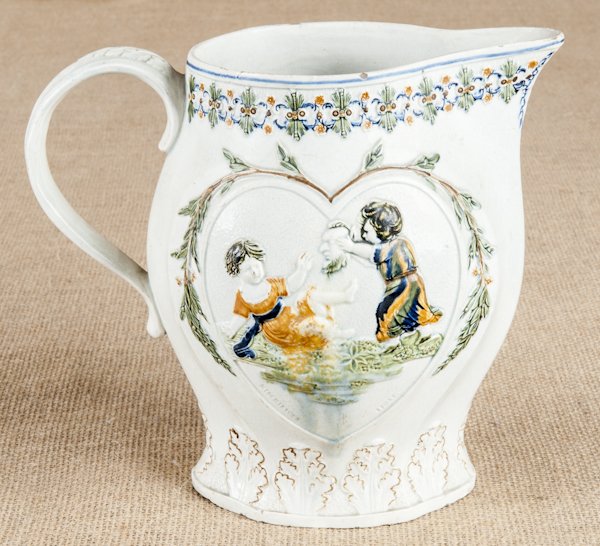 Prattware pearlware Mischievous Sport pitcher,: Prattware pearlware Mischievous Sport pitcher, 19th c., 8 1/2'' h.