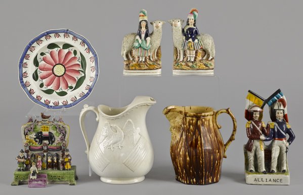 Group of miscellaneous Staffordshire figures, tog: Group of miscellaneous Staffordshire figures, together with an ironstone pitcher with an eagle and flags, 10 1/2'' h., a Bennington type pitcher, etc.