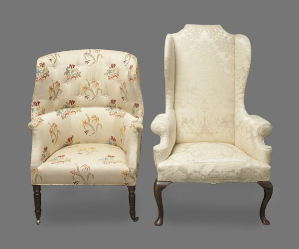 Sheraton style mahogany barrelback wing chair, to: Sheraton style mahogany barrelback wing chair, together with a George II style wing chair.