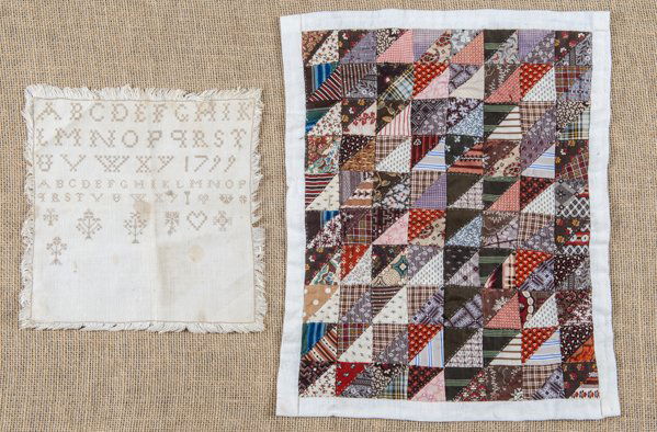 Patchwork doll quilt, 20th c., 16 1/2'' x 13 1/2'',: Patchwork doll quilt, 20th c., 16 1/2'' x 13 1/2'', together with a needlework sampler, dated 1799, 9 1/2'' x 9''.