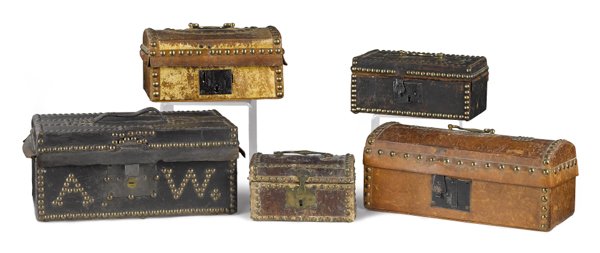 Group of leather bound trunks with brass tacking: Group of leather bound trunks with brass tacking, late 18th/early 19th c., the largest bearing the label of McCloud and Prescott, Boston, 5 1/2'' h., 12'' w.