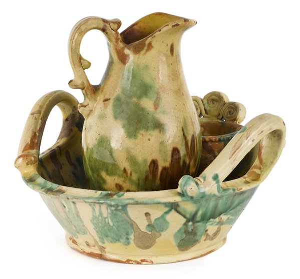 Shenandoah Valley, Virginia redware pitcher and: Shenandoah Valley, Virginia redware pitcher and bowl, 19th c., attributed to the Eberly Pottery, pitcher - 10 1/2'' h., bowl - 7'' h., 13 3/4'' dia.