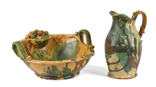Shenandoah Valley, Virginia redware pitcher and: Shenandoah Valley, Virginia redware pitcher and bowl, 19th c., attributed to the Eberly Pottery, with green and brown manganese splotching on a cream ground, pitcher - 11 1/2'' h., bowl - 7'' h., 15 1