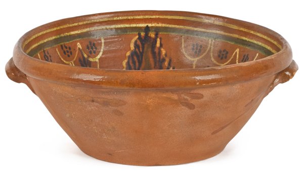 Moravian redware basin, dated 1856, with yell: Moravian redware basin, dated 1856, with yellow and green slip decoration, 5 1/2'' h., 14'' dia.