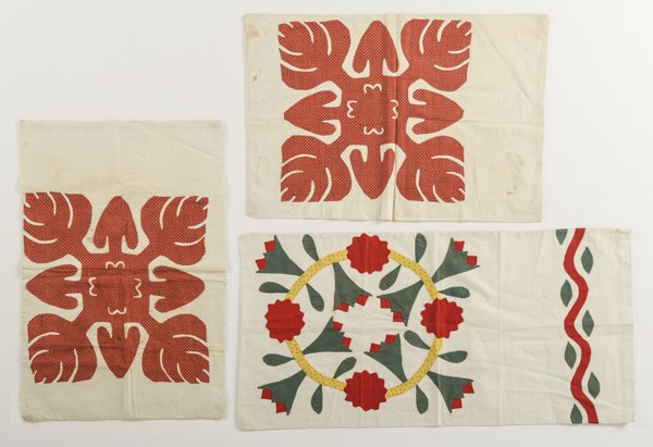 Three appliqu? Amish pillow covers, one with a: Three appliqu? Amish pillow covers, one with a Centennial Wreath and a pair with oak leaf pattern.