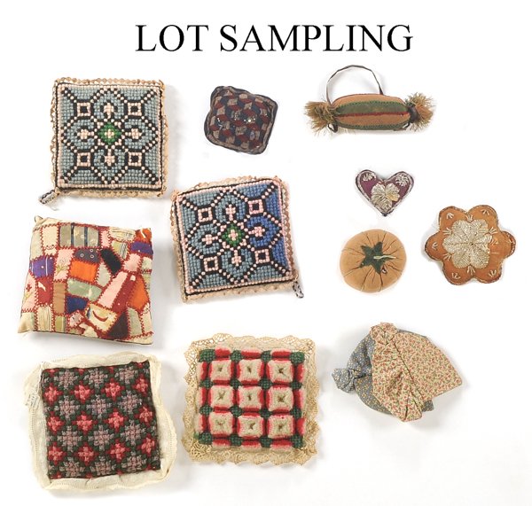 Group of Amish pincushions, mostly Lancaster Co: Group of Amish pincushions, mostly Lancaster County, including plush work, beaded, and quilted examples.