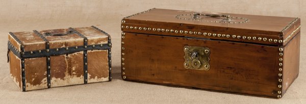 Massachusetts maple and pine lock box, labeled by: Massachusetts maple and pine lock box, labeled by George Domett Boston, the lock impressed J. Terry & Co. Terryville, CT., 8'' h., 20 3/4'' w., together with a hide covered box, 6'' h., 11 1/2'' w.