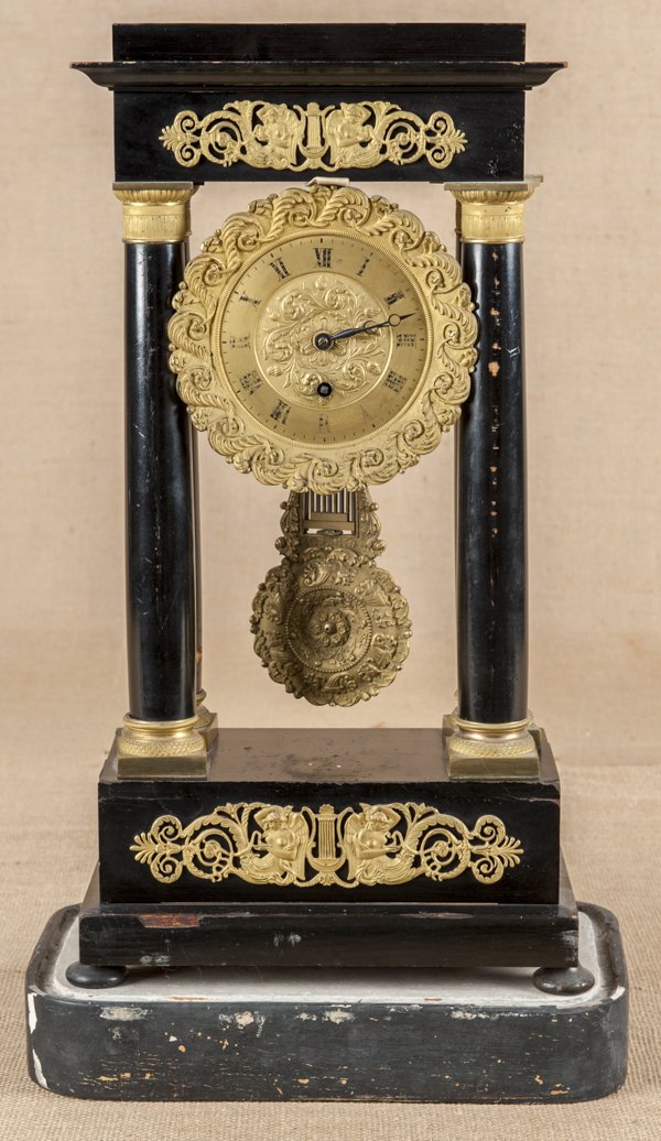 French ebonized and ormolu mounted portico clock,: French ebonized and ormolu mounted portico clock, 19th c., 19 1/2'' h.