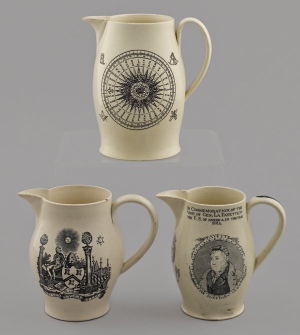 Three Liverpool pitchers, 19th c., decorated with: Three Liverpool pitchers, 19th c., decorated with Franklin, Lafayette, Masonic symbols, ship, etc., 5'' h., 5 1/4'' h., and 6 1/4'' h.
