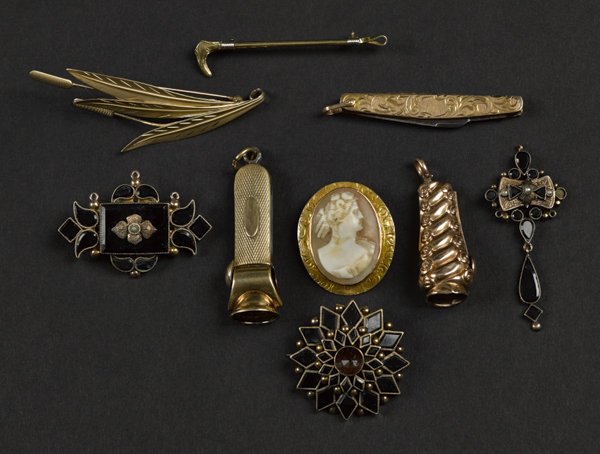 Group of 14K yellow gold, to include six pins, tw: Group of 14K yellow gold, to include six pins, two cigar tippers, and one pocket knife, 35.3 dwt.