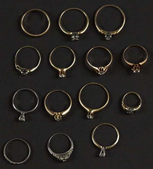 Fourteen diamond engagement and wedding rings in: Fourteen diamond engagement and wedding rings in yellow and white gold, 19.5 dwt.