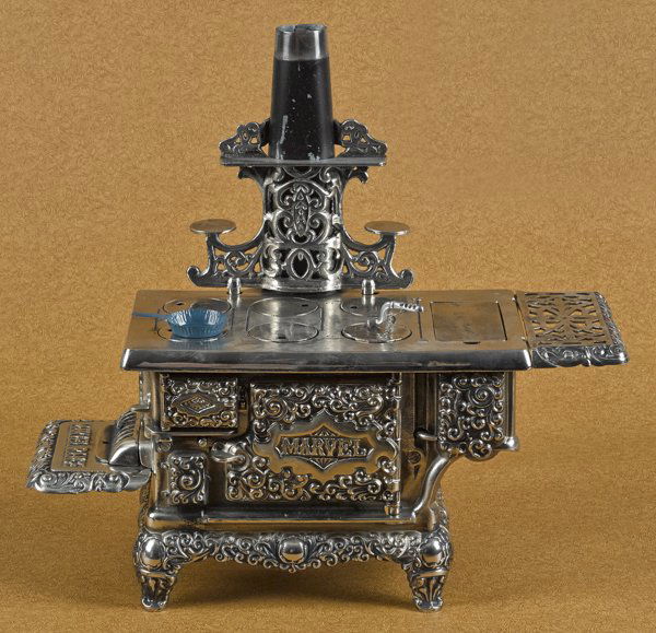 Kenton cast iron and nickel Marvel Range toy st: Kenton cast iron and nickel Marvel Range toy stove, 15 1/2'' h., 19 1/2'' w.