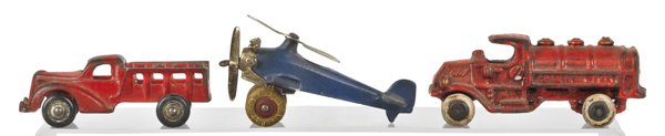 Cast iron Hubley Giro Plane, 4 1/2'' l., togethe: Cast iron Hubley Giro Plane, 4 1/2'' l., together with an Arcade truck, 4'' l., and a Champion gas truck, 4 1/2'' l.
