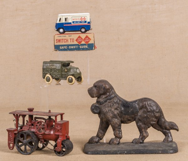 Hubley cast iron Huber road roller, 7 3/4'' l.,: Hubley cast iron Huber road roller, 7 3/4'' l., together with a reproduction Bell Telephone truck, 5'' l., a cast iron St. Bernard doorstop, 11'' l., and a Japanese tin friction Railway Express delive