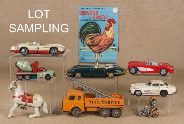 Group of miscellaneous toys, to include a tin fri: Group of miscellaneous toys, to include a tin friction Jaguar, a French Auto Service truck, a tin wind-up monkey on a trike, a tin wind-up rooster, two wooden dolls, a Balinese doll, a Brewster the Ro
