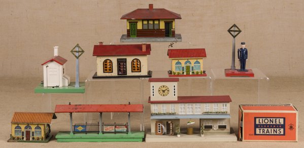 Group of miscellaneous Lionel train buildings, to: Group of miscellaneous Lionel train buildings, to include a Lioneltown #127 Station, a #48W Whistle Station, a Transformer Station, a #156 Platform, two #1045 Watchmans - one with its original box, an