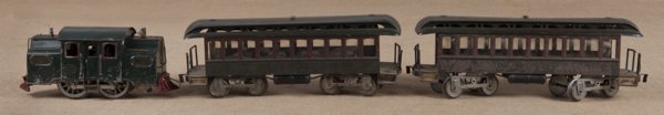 Lionel standard gauge #38 train engine, together: Lionel standard gauge #38 train engine, together with two passenger cars.