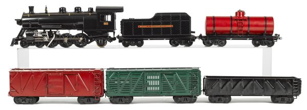Buddy L six-piece pressed steel outdoor train set: Buddy L six-piece pressed steel outdoor train set, to include a #963 Engine and Tender, a Gondola, a Tanker, and two boxcars.