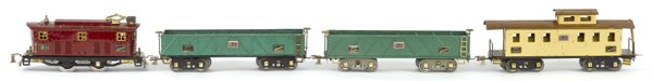 American Flyer standard gauge four-piece train se: American Flyer standard gauge four-piece train set, to include #4644 Engine, two #4017 Gondolas, and a #4011 Caboose.