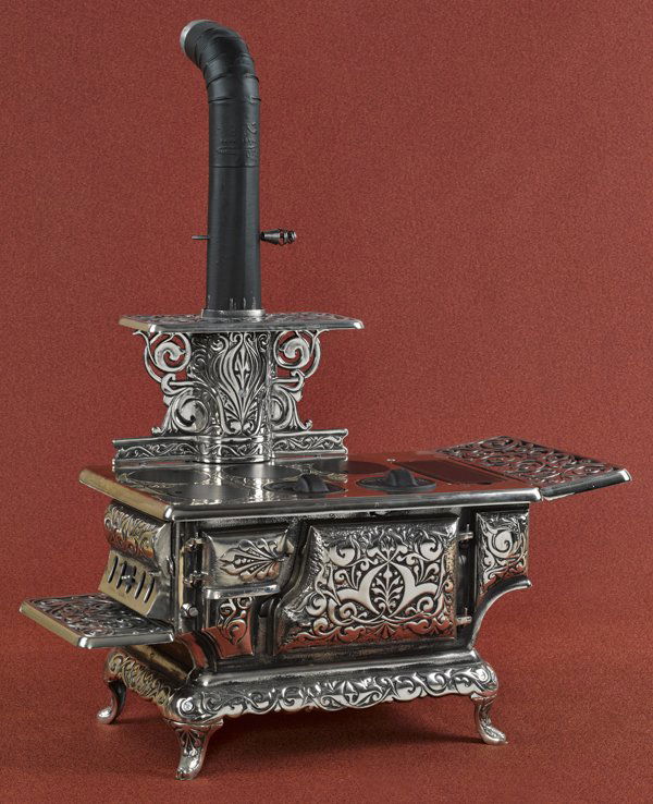 Ideal no. 5 cast iron, tin, and nickel toy cook s: Ideal no. 5 cast iron, tin, and nickel toy cook stove with provenance linking it to Franklin and Eleanor Roosevelt, 17 1/2'' h., 23 1/2'' w.