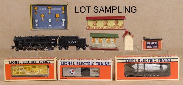 Miscellaneous Lionel train accessories and train: Miscellaneous Lionel train accessories and train cars, to include a #927 Lubricating Kit in the original box, an 85th Anniversary Box car in its original box, a Looney Tunes Outlaw car in its original