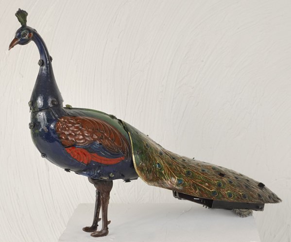Hans Ebrle painted tin wind-up peacock, 9 1/2'' l.: Hans Ebrle painted tin wind-up peacock, 9 1/2'' l.