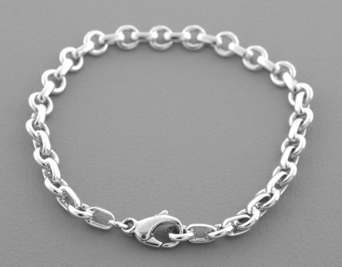 TIFFANY & Co. STERLING SILVER DONUT CHARM BRACELET (1 of 2)