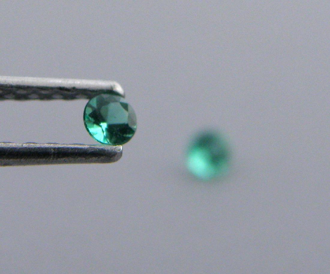 2.4mm MATCHING PAIR ROUND CUT COLOMBIAN EMERALD (1 of 1)