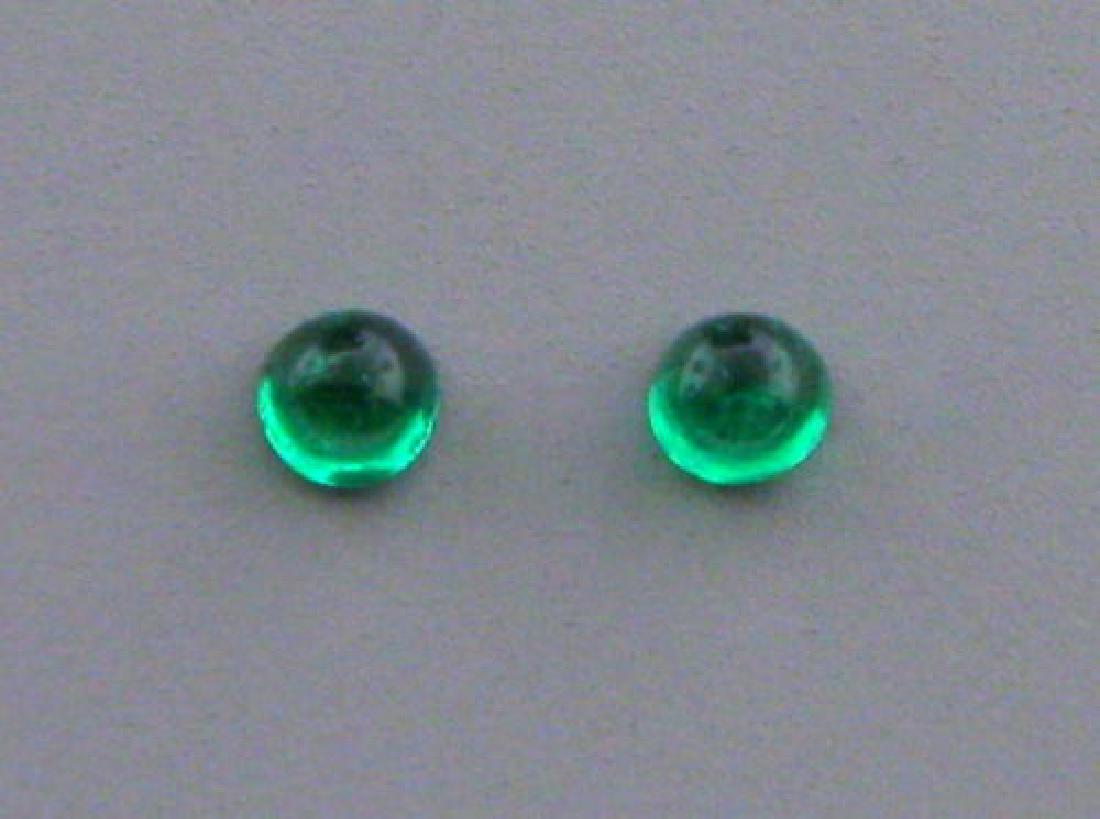 2.2mm ROUND MATCHING PAIR CABOCHON NATURAL EMERALD: Sale is for 2 round cabochon natural Colombian Emeralds Matching pair Emeralds measures 2.2mm in diameter Natural New, never used before
