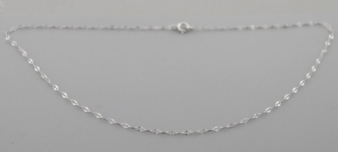 NEW 14K WHITE GOLD CABLE CHAIN ANKLET CHAIN, 11" LONG: 14K WHITE GOLD CABLE 11" ANKLETAnklet measures 11" Long x 1.2mm Wide14K White gold chainNew, in excellent condition, please refer to picsStamped 585Total weight 0.3 grams