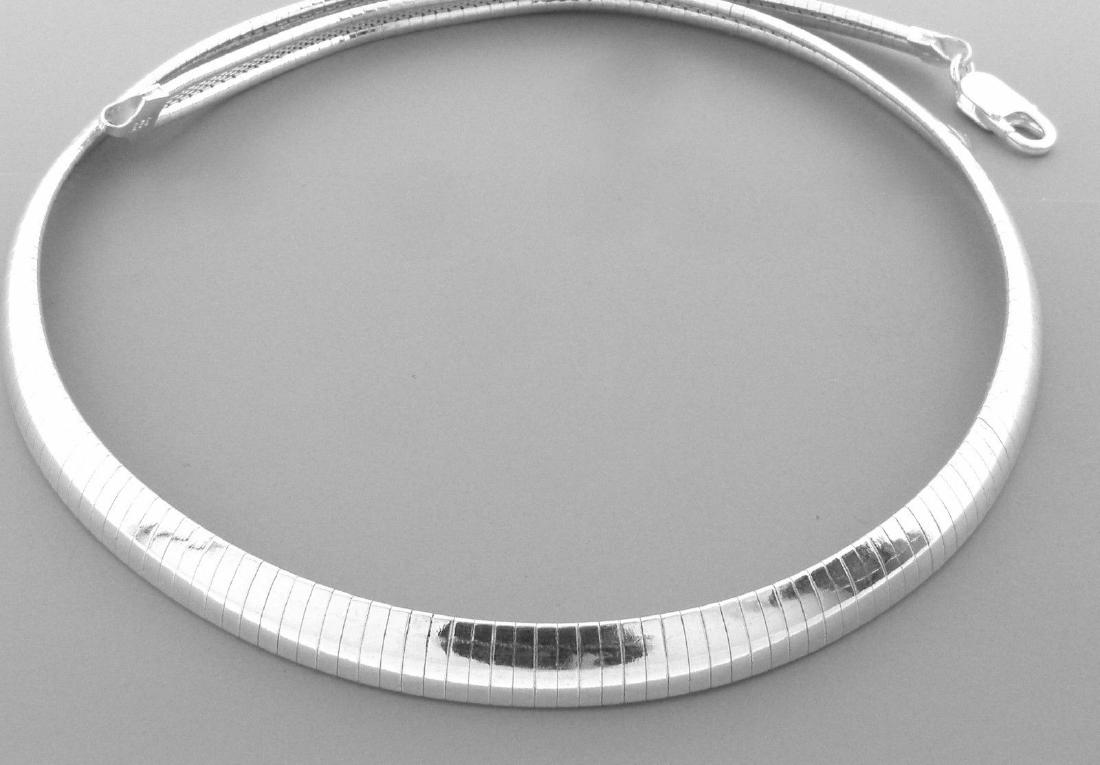 STERLING SILVER HEAVY OMEGA CHOKER NECKLACE 8MM 18": STERLING SILVER DOMED OMEGA CHOKER CHAIN Necklace measures 18" Long x 8mm Wide Sterling silver chain New in Excellent condition Stamped ITALY 925 Total weight 38.1 grams