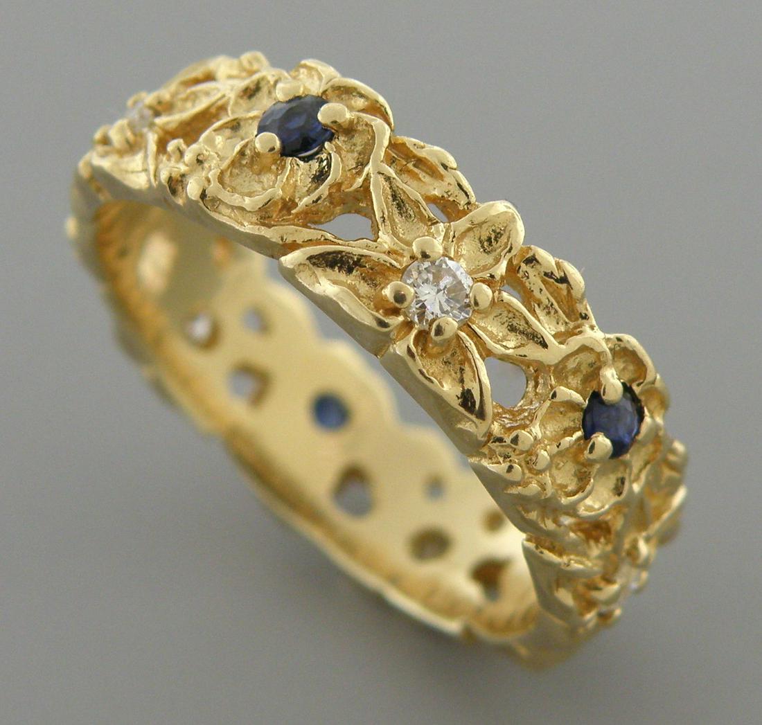 VINTAGE 14K GOLD DIAMOND SAPPHIRE RING WEDDING BAND: VINTAGE 14K GOLD DIAMOND AND SAPPHIRE WEDDING BAND RING SIZE 6.5 Ring size is a 6.5 Please contact us if you want us to size it, we can size for a small fee. Ring measures 5.9mm Wide 14K Yellow gold, 