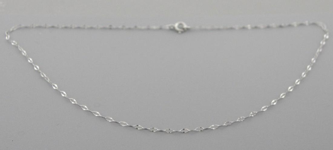 NEW 14K WHITE GOLD CABLE CHAIN ANKLET CHAIN, 11" LONG: 14K WHITE GOLD CABLE 11" ANKLETAnklet measures 11" Long x 1.2mm Wide14K White gold chainNew, in excellent condition, please refer to picsStamped 585Total weight 0.3 grams