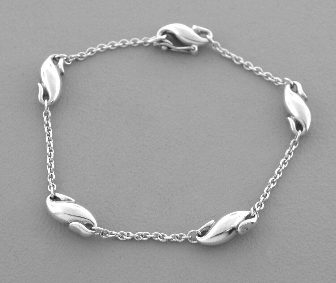 TIFFANY & CO. STERLING SILVER INFINITY BRACELET (1 of 2)
