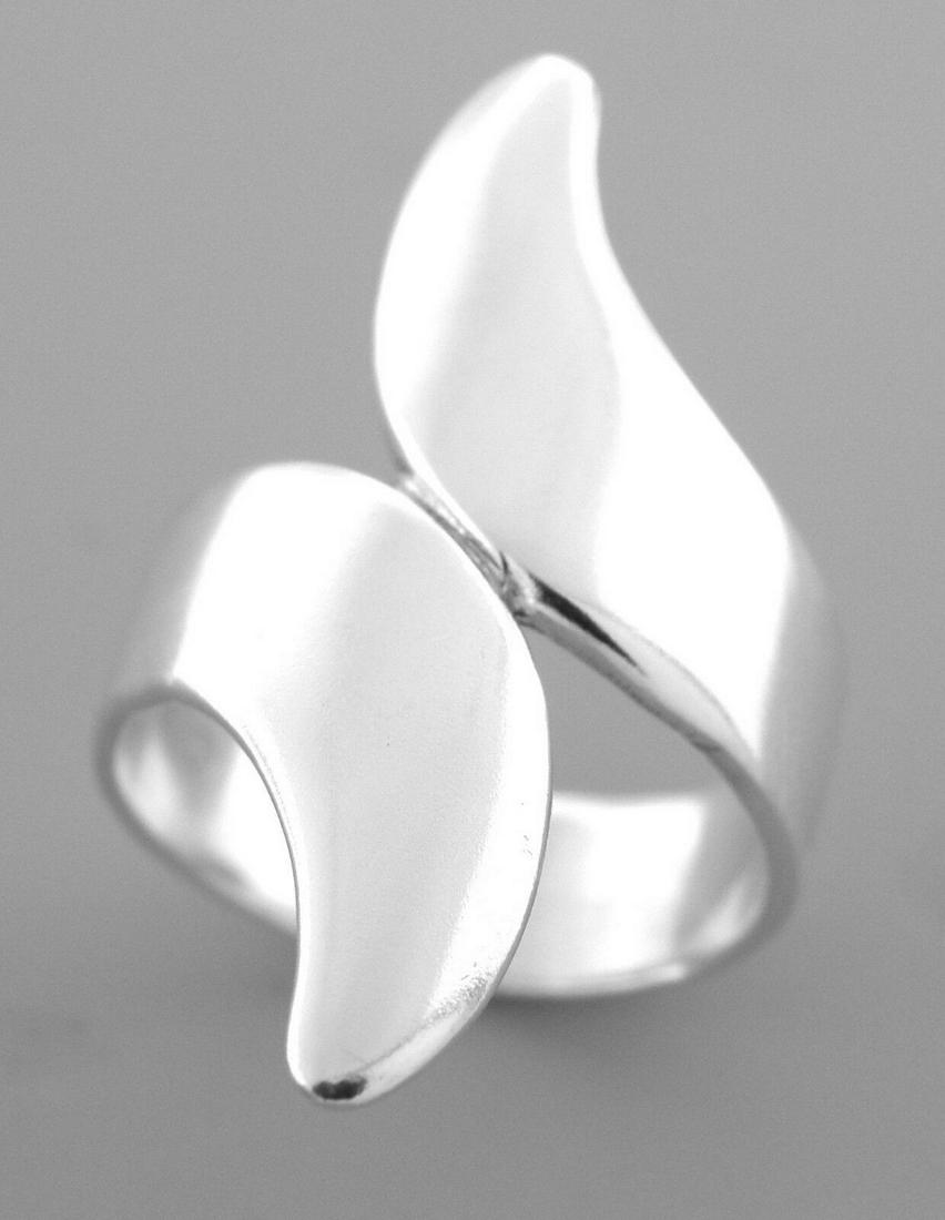 JAMES AVERY STERLING SILVER BYPASS RING SIZE 7.5: JAMES AVERY STERLING SILVER RINGSize 7.5Measures 1.28" long in frontJames Avery Sterling silver bypass ring Vintage, Pre-owned, in good condition, minor wear due to age, please refer to picsStamped JA