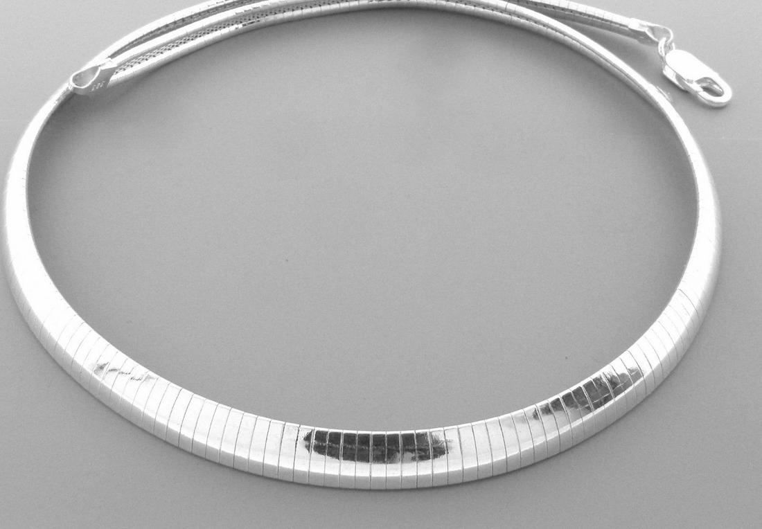 STERLING SILVER HEAVY OMEGA CHOKER NECKLACE 8MM 18": STERLING SILVER DOMED OMEGA CHOKER CHAIN Necklace measures 18" Long x 8mm Wide Sterling silver chain New in Excellent condition Stamped ITALY 925 Total weight 38.1 grams