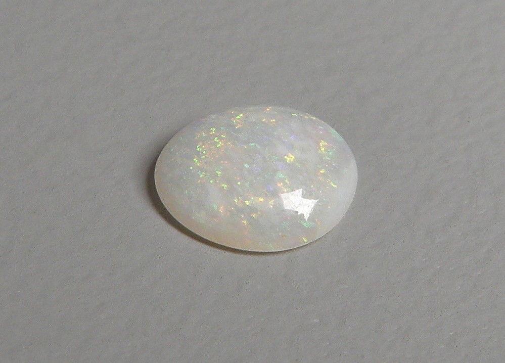 1.90CT NATURAL UNTREATED WHITE MULTI COLORED OPAL (1 of 2)