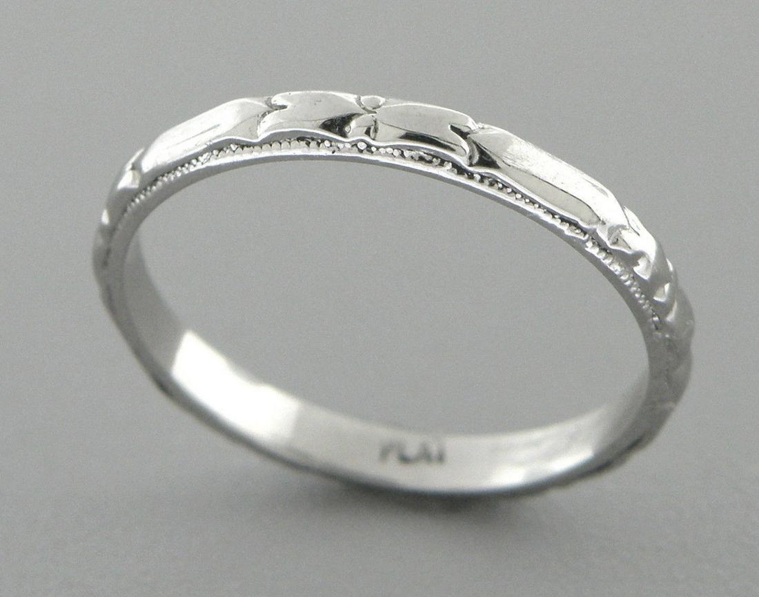 PLATINUM RING FULL ETERNITY FLOWER WEDDING BAND: PLATINUM FLOWER WEDDING BAND RING SIZE 5.75 Ring size is a 5.75 Ring measures 2.1mm wide Platinum, wedding band with engraved design & filigree pattern all the way round Ring is in Excellent condition
