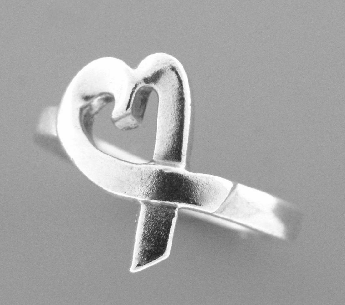 TIFFANY & Co. STERLING SILVER PALOMA PICASSO HEART RING: TIFFANY & Co. STERLING SILVER LOVING HEART RING SIZE 5 Ring size is a 5 (can easily be resized by your local jeweler) Ring measures 14.8mm wide on top Sterling silver Stamped TIFFANY & CO 925 PALOMA P