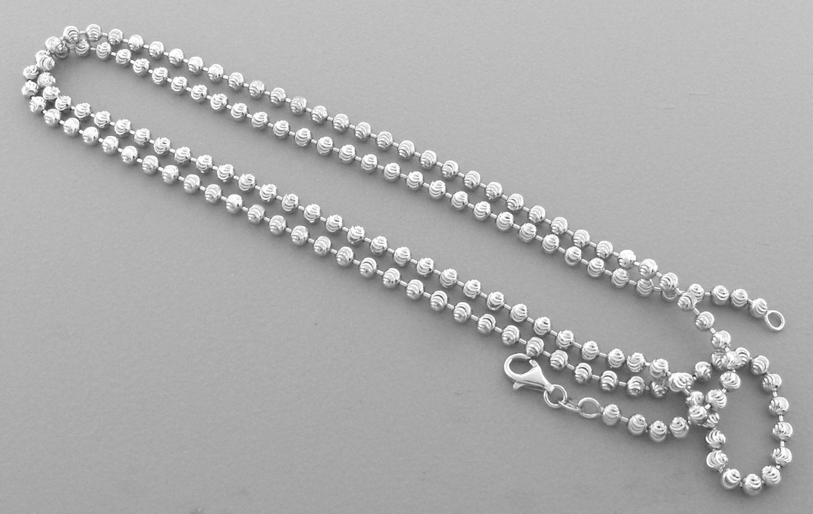 BALL MOON CHAIN STERLING SILVER ITALIAN NECKLACE 3mm: NEW STERLING SILVER HALF MOON BALL CHAIN NECKLACE New sterling silver half moon ball chain necklace Balls are diamond cut, which makes it shiny Size 3mm wide, 20" Long Weight apx 10g